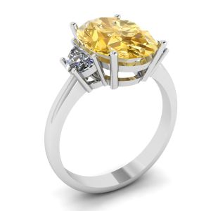Ring mit ovalem gelbem Diamant und seitlichem Halbmond aus weißen Diamanten aus Weißgold - Foto 3