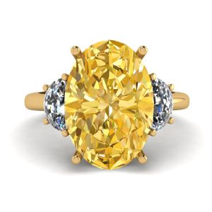 Ovaler Ring mit gelbem Diamant und seitlichem Halbmond aus weißen Diamanten aus Gelbgold
