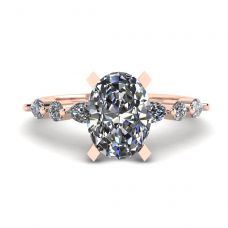Ovaler Ring mit seitlichem Marquise-Diamant und runden Steinen aus Roségold