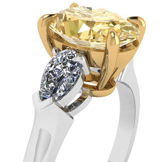 Ovaler Ring mit gelbem Diamant und seitlichem, birnenförmigem, weißem Diamantring, More Image 0