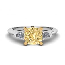 Kissenförmiger Ring mit gelbem Diamant und seitlichen weißen Birnen